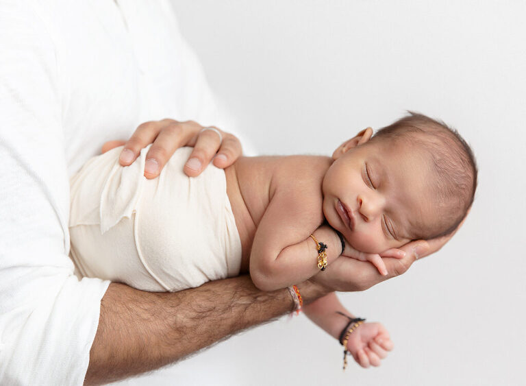 Austin Texas Newborn on dads arm